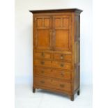 19th Century oak press cupboard, fitted two panelled doors above two short and three long drawers,