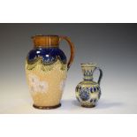 Doulton Lambeth stoneware jug together with similar small ewer