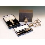 Assorted silver to include; Christening set of egg cup and spoon, toast rack, urn pepperette,