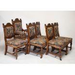 Set of six late 19th/early 20th Century oak dining chairs comprising padded arm elbow chair, and