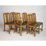 1930's period light oak draw-leaf table with a set of five chairs comprising one carver and four