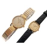 Longines - Two lady's gold-plated wristwatches, the first with circular champagne dial, date at 3,