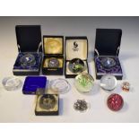 Group of glass paperweights to include Selkirk glass, Wedgwood, and others, some boxed (approx 11 in