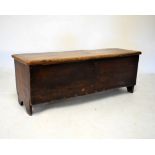 Antique elm six plank chest having hinged cover with moulded edge, 114cm wide x 43cm high x 34cm