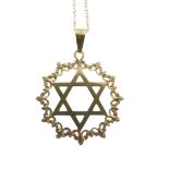 Judaica - Yellow metal 'Star of David' pendant with wreath surround, stamped 750, together with an
