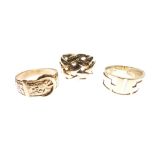 Two gentlemen's 9ct gold rings, one formed as a buckled belt, another with knot-work design, and a