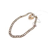 9ct gold bracelet of curb link design with padlock, 9.4g approx