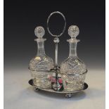 Silver-plated two bottle table cruet on oval stand, 19cm high