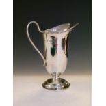 George V silver cream jug of helmet form, London 1932, 13.5cm high, 3.7toz approx