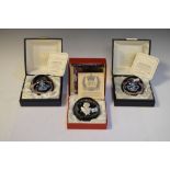 Two Caithness glass limited edition Jubilee floating crown paperweights, together with a Baccarat