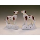 Pair of 19th Century English porcelain standing spaniels, on naturalistic bases, 9cm high