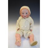 Vintage 20th Century German Armand Marseille bisque headed doll in knitted clothing, marks to back