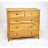 Modern light oak chest of two short over three long drawers, 90cm wide