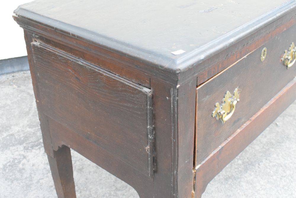 18th Century oak dresser base fitted three drawers with brass swan neck handles, raised on turned - Image 2 of 8