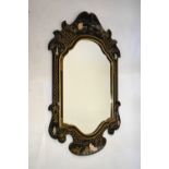 Reproduction black lacquer finish shaped rectangular mirror decorated with chinoiserie scenes,