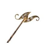 Diamond set stickpin, the mount formed as a 'N', stamped 15ct, 1.1g gross approx