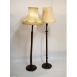 Two similar beech standard lamps