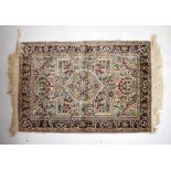 Good quality modern silk rug having decoration of birds and vases of flowers within a multi-border