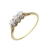 18ct gold dress ring set three diamonds, the shank stamped 0.25ct, size N, 3.1g gross approx