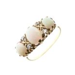 Dress ring set three graduated opals and four diamonds, the shank unmarked, size Q, 3.2g gross