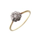 Dress ring set diamond daisy cluster, size Q½. The shank stamped 18ct, 2.1g gross approx