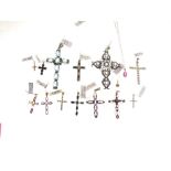 Collection of gem set crucifix pendants