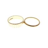 22ct gold wedding band and a textured 18ct gold wedding band, size O and P respectively, 9.4g