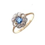 Dress ring set sapphire and diamond cluster, the shank stamped 18ct, size N½, 2.2g gross approx