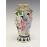 Polychrome decorated baluster shaped vase having continuous decoration depicting figures in a