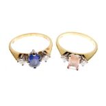 Two 18ct gold dress rings, the first with central oval sapphire between two diamonds, the second set