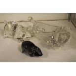 Two glass decorative pigs, together with lion dish