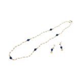 Freshwater pearl necklace interspersed with blue beads and yellow metal beads, 42cm long, clasp