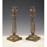 Pair of 19th Century French Empire-style bronze candlesticks with gilt highlights, 19.5cm high
