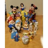 Group of modern Disney collectable figurines to include; Mickey and Minnie Mouse, Snow White and the