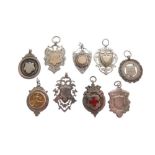 Nine assorted early 20th Century silver sporting fob medallions, 2.1toz gross approx