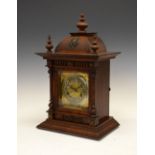 Early 20th Century German oak-cased mantel clock, with Junghans movement striking on a coiled