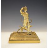 Early 19th Century gilt bronze figure of Diana the Huntress with hound, on stepped rectangular base,