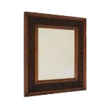 Indian hardwood rectangular mirror with bevelled central plate within pierced decoration, 53.5cm
