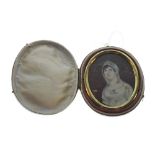 19th Century oval miniature with bust length portrait of a young lady, 6.5cm high, in fitted red