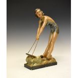 Art Deco-style composition figure of a lady surfing, impressed to base RD 623880m 38cm high