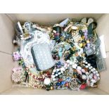 Assorted costume and dress jewellery to include bead necklaces, modern purse and lipstick case