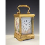 Small brass-cased carriage timepiece, the Roman dial inscribed Elliott & Son London above cherubs,