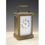 Early 20th Century brass carriage timepiece, 11cm high excluding handle