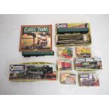 Mixed quantity of railway related model kits to include; Airfix meat van, Cement wagon, Brake van