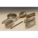 Group of early 20th Century silver-backed dressing table brushes etc