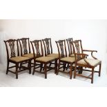 Set of seven (six standards plus one elbow chair) Chippendale Revival mahogany dining chairs, each