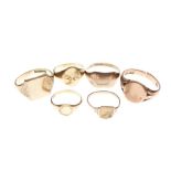 Six assorted 9ct gold and yellow metal signet rings, 18g approx (6)