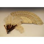 Two early 20th Century fans, one feather, the other paper (2)