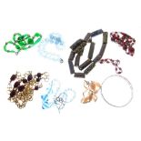 Assorted costume jewellery to include a millefiori glass necklace, further bead and paste necklaces,