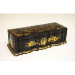 Victorian lacquered papier-mâché table box of serpentine form, the hinged cover decorated with